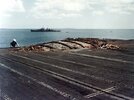 Damaged_flight_deck_of_USS_Enterprise_CV-6_in_August_1942-640x480.jpg