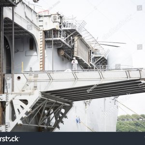 stock-photo-uss-kearsarge-lhd-wasp-class-amphibious-assault-ship-docked-at-pier-s-aircraft-ele...jpg